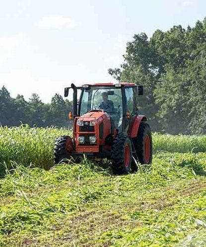 A tractor prepares this years crops 