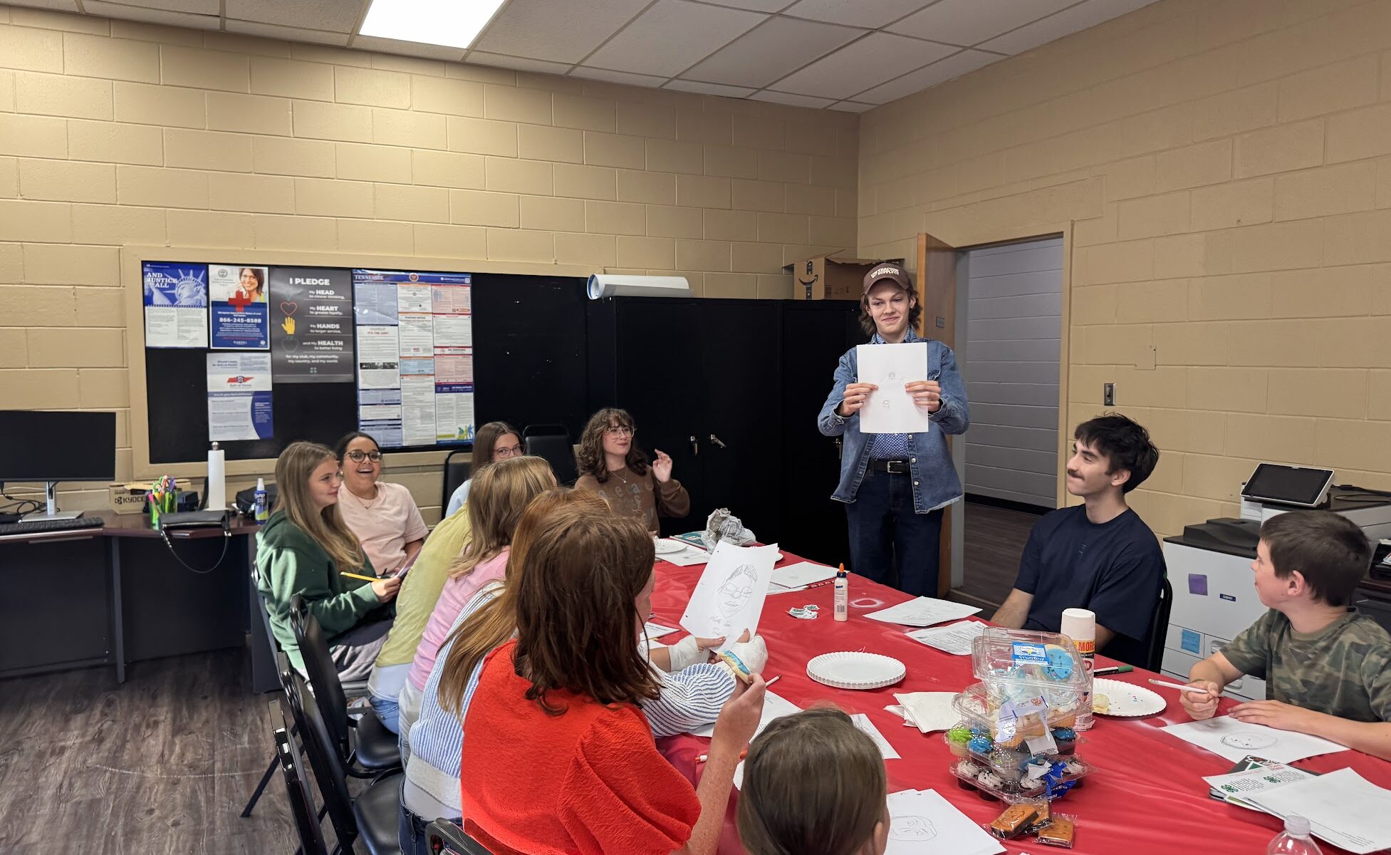 Jasper Beaty shows off art from get to know you activity.